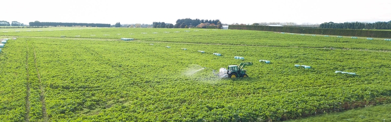 Image of tow and fert spraying over wintering block